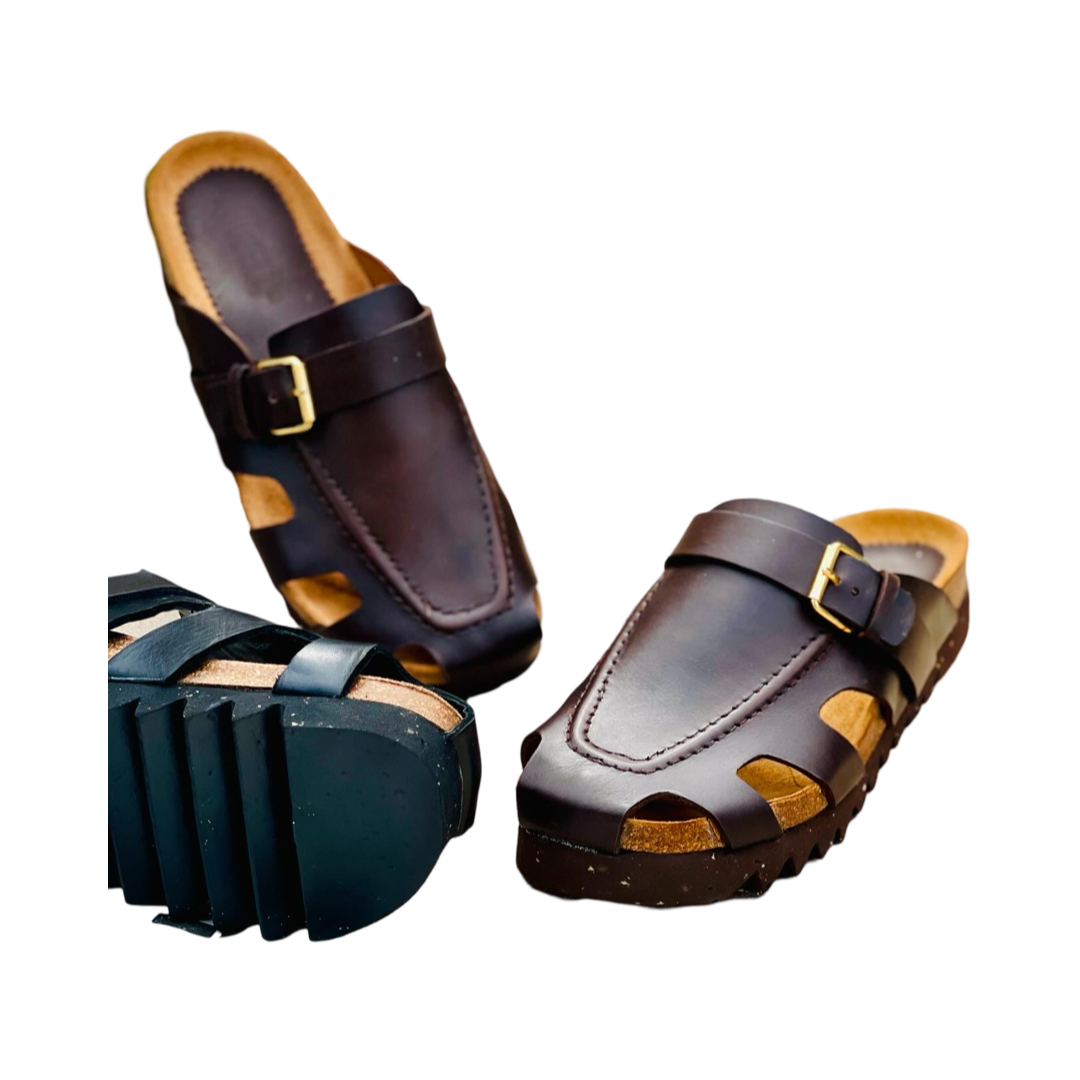 Webclog pair showing leather upper and gold buckle